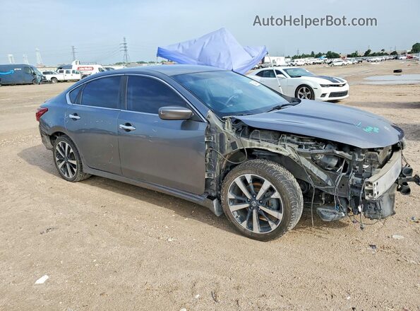 1N4AL3AP7JC248289 2018 NISSAN ALTIMA Gray Delantero derecho