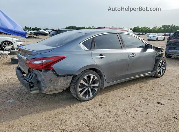 1N4AL3AP7JC248289 2018 NISSAN ALTIMA Gray Trasero derecho