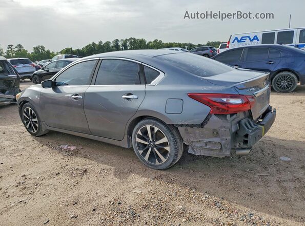 1N4AL3AP7JC248289 2018 NISSAN ALTIMA Gray Trasero izquierdo