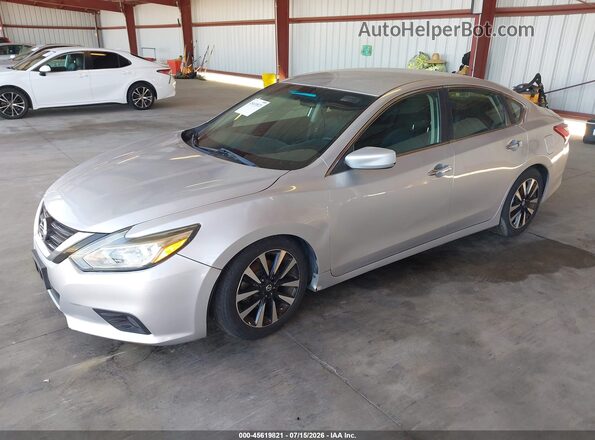 1N4AL3AP7JC283317 2018 NISSAN ALTIMA Silver Vista tres cuartos delantera izquierda