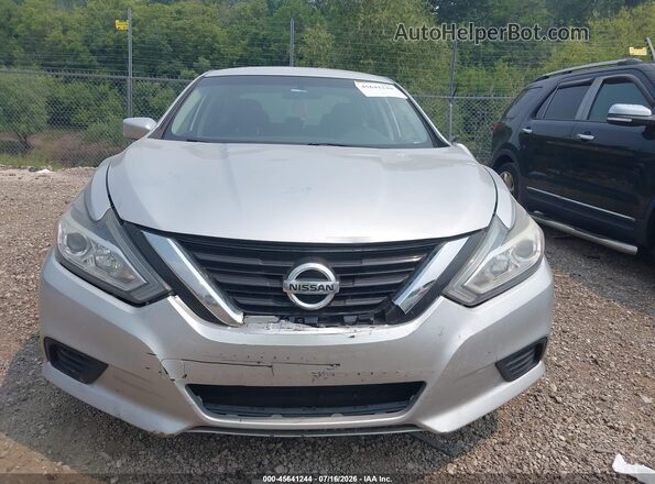 1N4AL3AP8JC289305 2018 NISSAN ALTIMA Серебряный Вид панели приборов