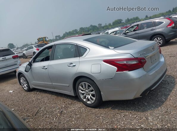 1N4AL3AP8JC289305 2018 NISSAN ALTIMA Серебряный Вид задней части салона