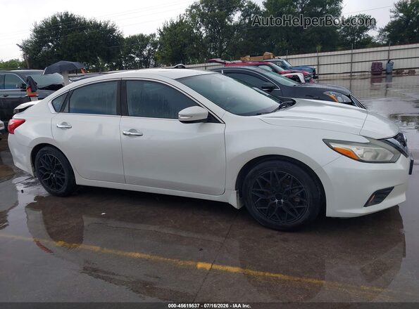 1N4AL3AP9GC168713 2016 NISSAN ALTIMA Cream Vista interior trasera