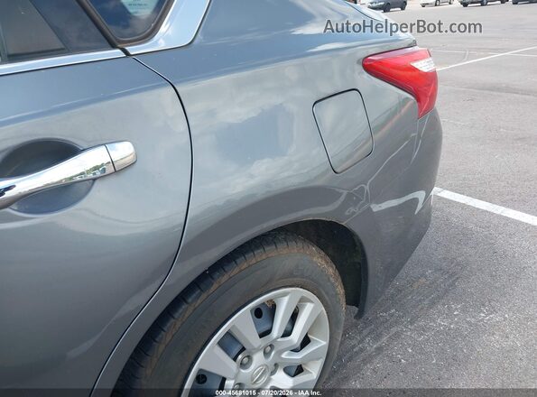 1N4AL3AP9GC180330 2016 NISSAN ALTIMA Silver Widok deski rozdzielczej