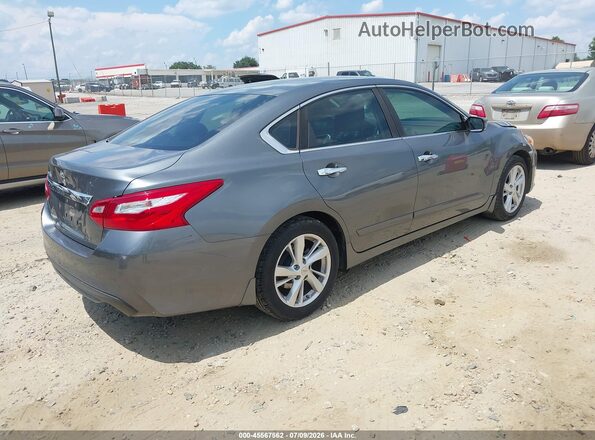 1N4AL3AP9GC233091 2016 NISSAN ALTIMA Gray Trasero derecho