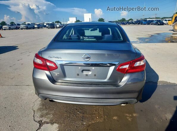 1N4AL3AP9GN325547 2016 NISSAN ALTIMA Silver Հետևի տեսք