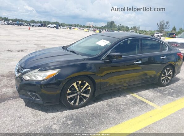 1N4AL3APXGN333124 2016 NISSAN ALTIMA Черный Вид задней части салона