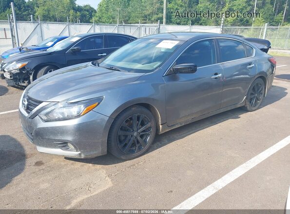 1N4AL3APXHC178703 2017 NISSAN ALTIMA Gray Vista tres cuartos delantera izquierda