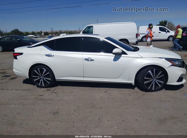 1N4AL4FVXLC173782 2020 NISSAN ALTIMA White Вид задньої частини салону
