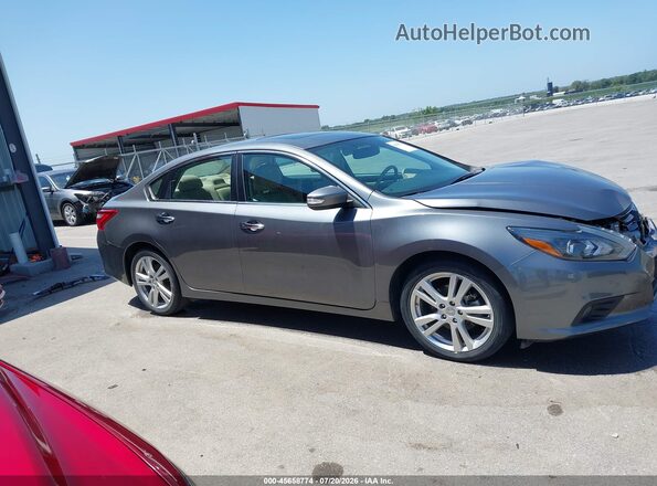 1N4BL3APXGC126572 2016 NISSAN ALTIMA Gray Սալոնի հետևի տեսք