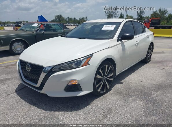 1N4BL4CVXKC116893 2019 NISSAN ALTIMA White Vista tres cuartos delantera izquierda