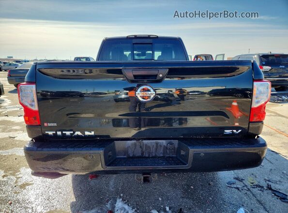 1N6AA1C62KN534370 2019 NISSAN TITAN Black Vista trasera
