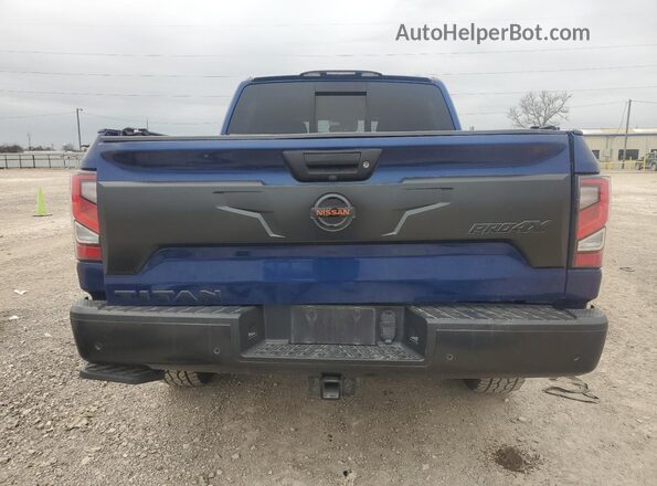 1N6AA1ED1MN504940 2021 NISSAN TITAN Blue Vista trasera