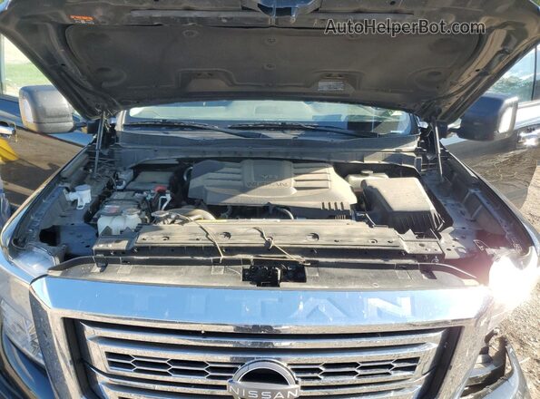 1N6AA1ED2RN104103 2024 NISSAN TITAN Black Vista interior trasera