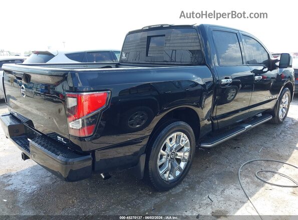 1N6AA1EF1LN506560 2020 NISSAN TITAN Черный Задняя правая четверть