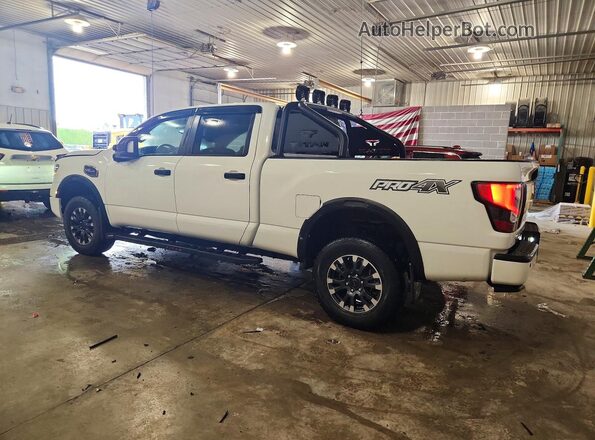 1N6AA1FB7MN510237 2021 NISSAN TITAN Белый Задняя левая четверть