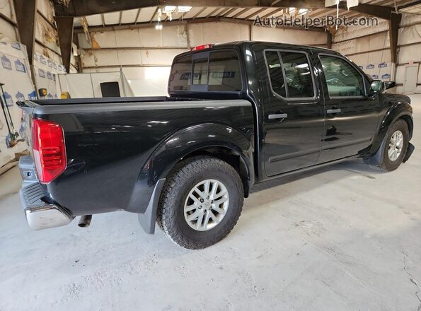 1N6AD0EV4JN772791 2018 NISSAN FRONTIER Black VIN კოდის სტიკერის ხედი