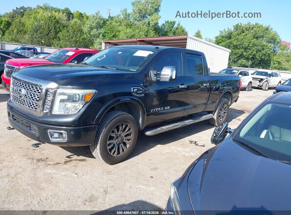 1N6BA1F29GN504769 2016 NISSAN TITAN XD Black Vista tres cuartos delantera izquierda