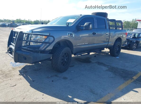 1N6BA1F38HN565864 2017 NISSAN TITAN XD Серебряный Передняя левая четверть