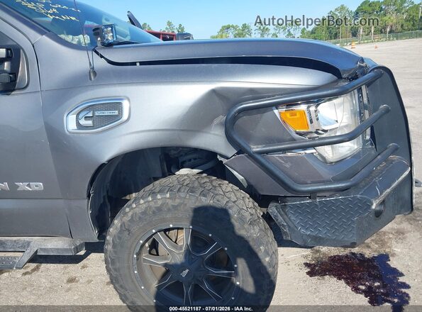 1N6BA1F38HN565864 2017 NISSAN TITAN XD Серебряный Вид спереди