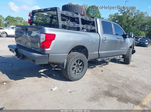 1N6BA1F38HN565864 2017 NISSAN TITAN XD Серебряный Задняя правая четверть