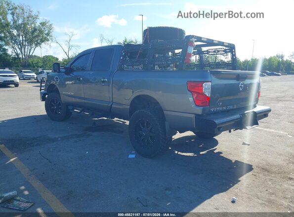 1N6BA1F38HN565864 2017 NISSAN TITAN XD Серебряный Задняя левая четверть