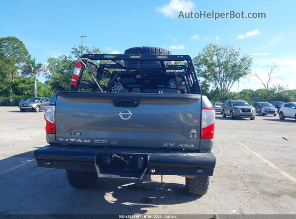 1N6BA1F38HN565864 2017 NISSAN TITAN XD Серебряный 