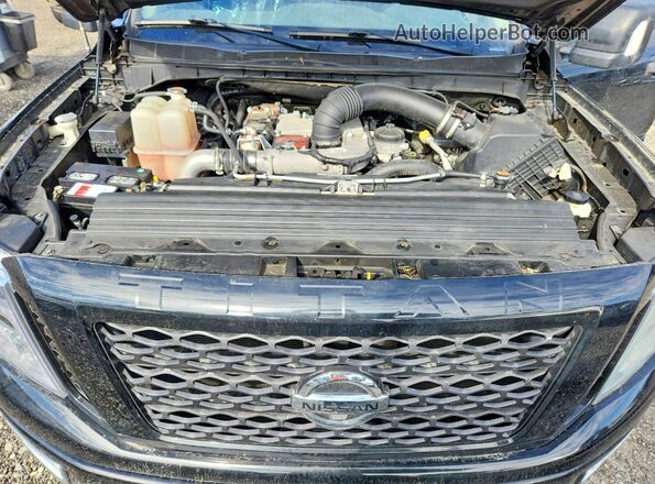 1N6BA1F40GN515516 2016 NISSAN TITAN Black Rear interior view
