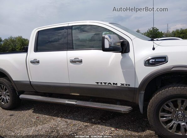 1N6BA1F40HN565656 2017 NISSAN TITAN XD White Սալոնի հետևի տեսք