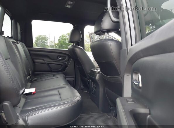 1N6BA1F40JN520285 2018 NISSAN TITAN XD Black Вид наклейки з VIN-кодом