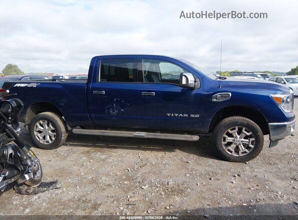 1N6BA1F41GN509840 2016 NISSAN TITAN XD Dark Blue Вид задньої частини салону