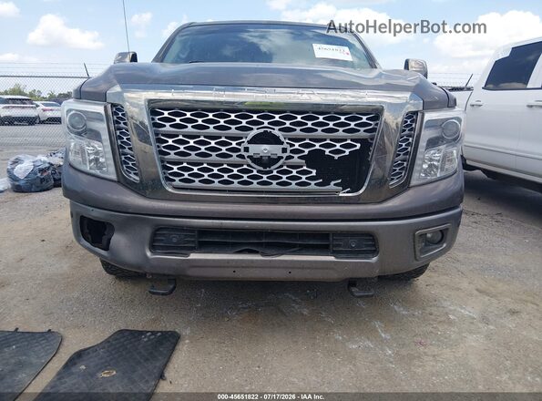 1N6BA1F44KN517620 2019 NISSAN TITAN XD Gray Front view