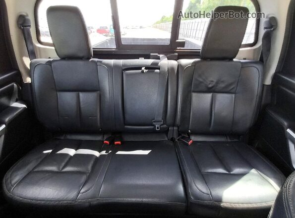 1N6BA1F47GN510507 2016 NISSAN TITAN Silver Vista de los asientos traseros