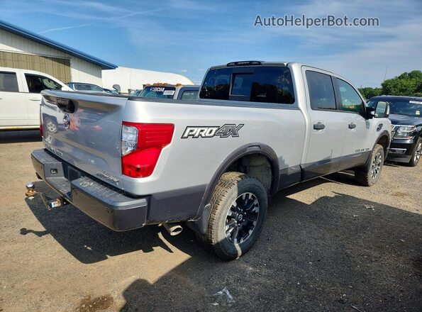 1N6BA1F47KN533424 2019 NISSAN TITAN Silver Rear right