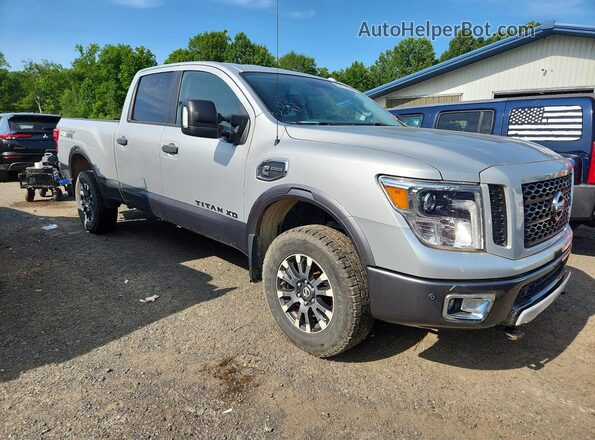 1N6BA1F47KN533424 2019 NISSAN TITAN Silver Front right