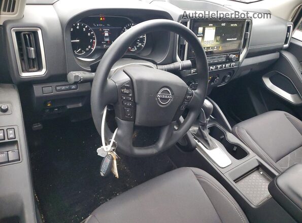 1N6ED1CM3SN606183 2025 NISSAN FRONTIER White Вид панелі приладів