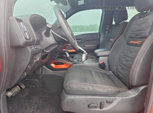 1N6ED1EK4SN649927 2025 NISSAN FRONTIER Orange Widok wnętrza z przodu