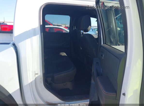 1N6ED1EKXTN632518 2026 NISSAN FRONTIER White Vista de la etiqueta del VIN