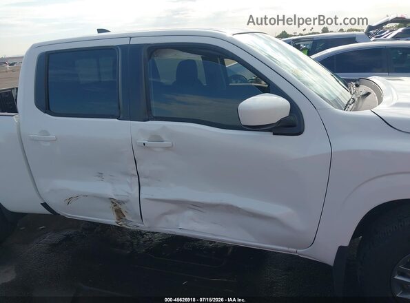 1N6ED1FJXTN629009 2026 NISSAN FRONTIER White Widok wnętrza z tyłu