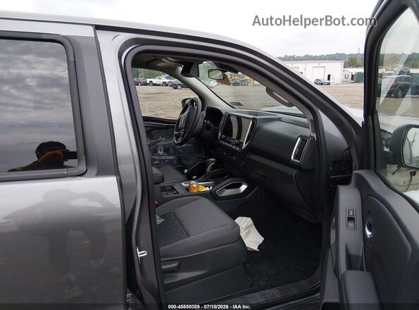 1N6ED1FK3TN607068 2026 NISSAN FRONTIER Черный Вид салона спереди