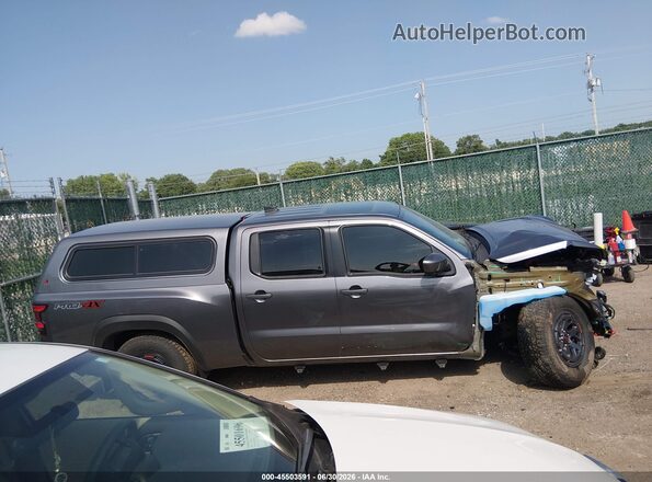 1N6ED1FKXTN629696 2026 NISSAN FRONTIER Black Widok wnętrza z tyłu