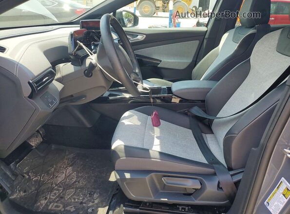 1V2CMPE88PC009884 2023 VOLKSWAGEN ID.4 Серый Вид салона спереди