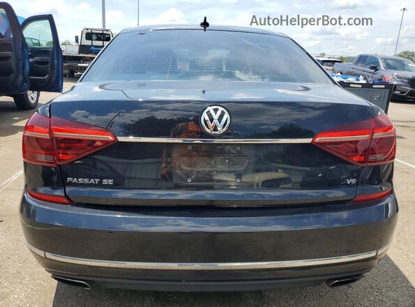 1VWHM7A38HC061774 2017 VOLKSWAGEN PASSAT Black Rear view