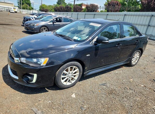 JA32U2FU8GU008027 2016 MITSUBISHI LANCER Black Rear left