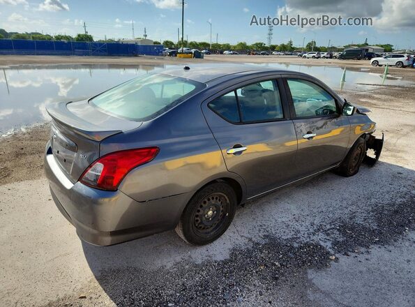 3N1CN7AP6KL867723 2019 NISSAN VERSA Серебряный Передняя правая четверть