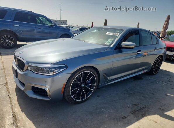 WBAJB9C5XJB035786 2018 BMW M5 Blue Tył lewy