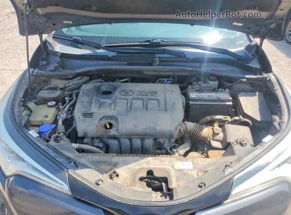 NMTKHMBXXJR011913 2018 TOYOTA C-HR Black Vista de la etiqueta del VIN