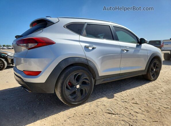 KM8J33A26GU038358 2016 HYUNDAI TUCSON Серебряный Передняя правая четверть