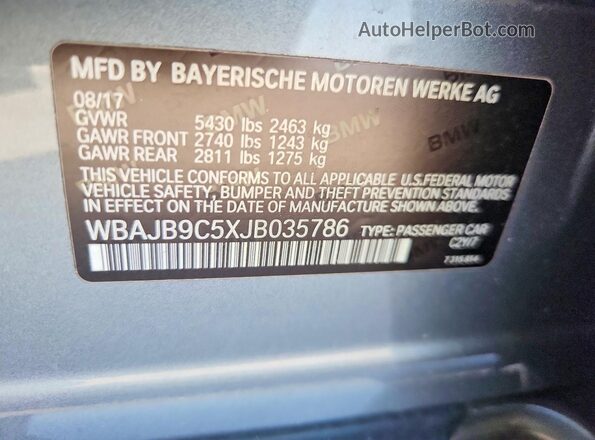 WBAJB9C5XJB035786 2018 BMW M5 Blue Widok naklejki z numerem VIN