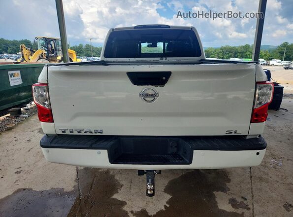 1N6AA1E62HN537775 2017 NISSAN TITAN Белый Вид салона спереди